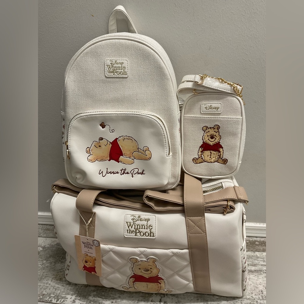 NWt Winnie the Pooh weekender bag, backpack and phone crossbody bag
